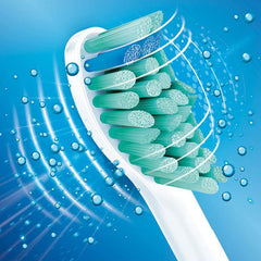 Snap-on brush head attachment to Philips Sonicare handle