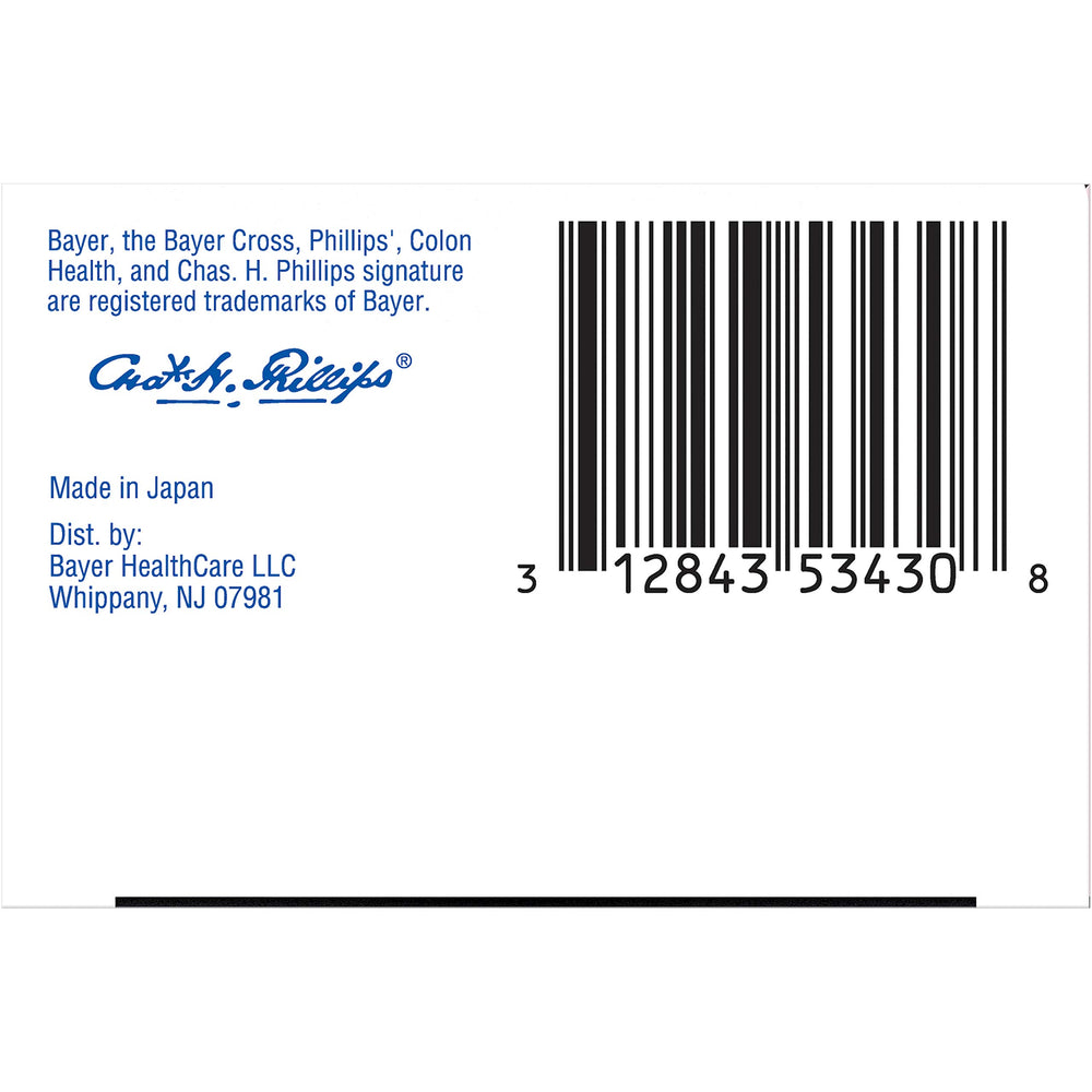 Capsules and bottle on white background