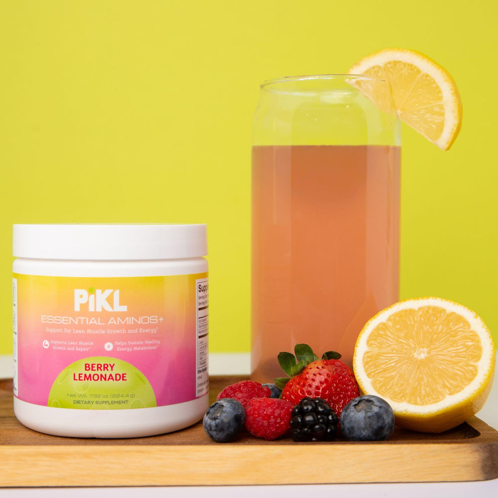 Powder dissolving in water to form PiKL Berry Lemonade drink