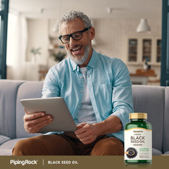 Non-GMO and Gluten Free label on black seed oil bottle