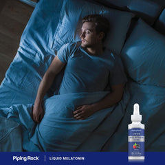 Lifestyle image showing restful sleep ambiance with Piping Rock melatonin