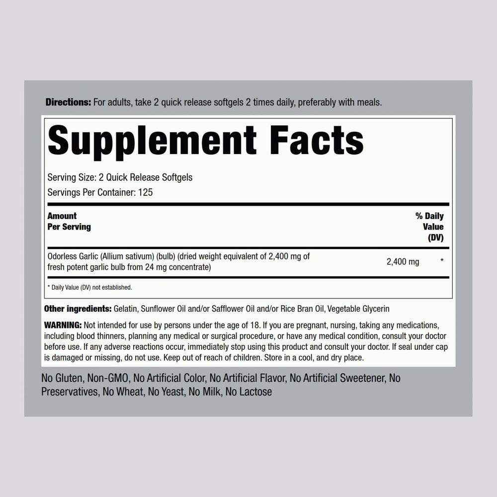 Garlic supplement bottle with product label close-up