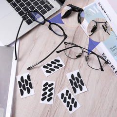 Product image featuring packaging contents and included nose pads.