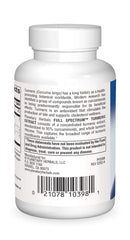 Close-up of turmeric extract tablets showing 95% curcuminoids