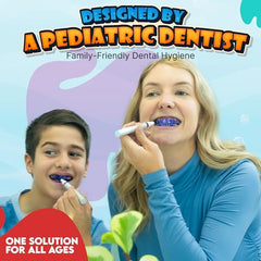 Teeth with purple plaque stain highlighting brushing gaps