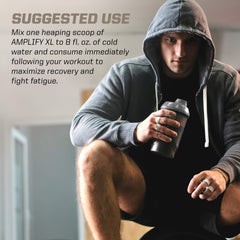 Prepared Mango Mania protein shake with scoop