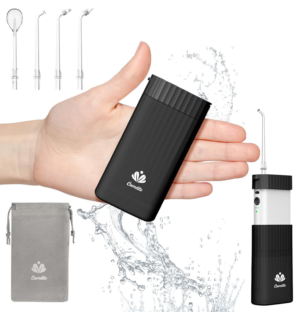 Black portable water flosser handheld with collapsible water tank