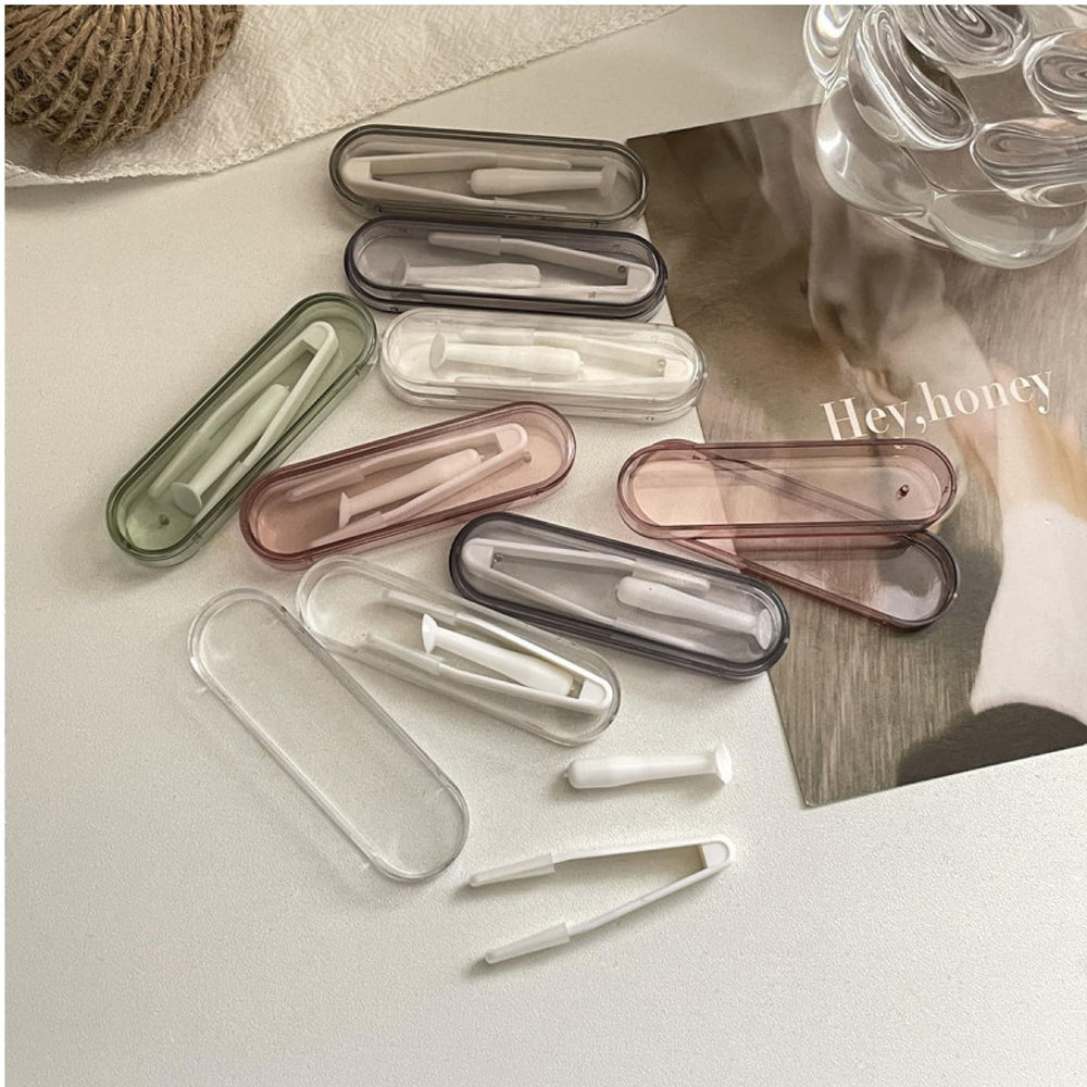 Close-up of inserter/remover and soft-tip tweezer in pink