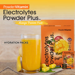 PowderVitamin Electrolytes Keto Mango Passionfruit dissolving in water for refreshing sugar-free hydration.