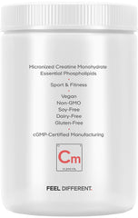 Serving scoop adding creatine powder to a drink for workout