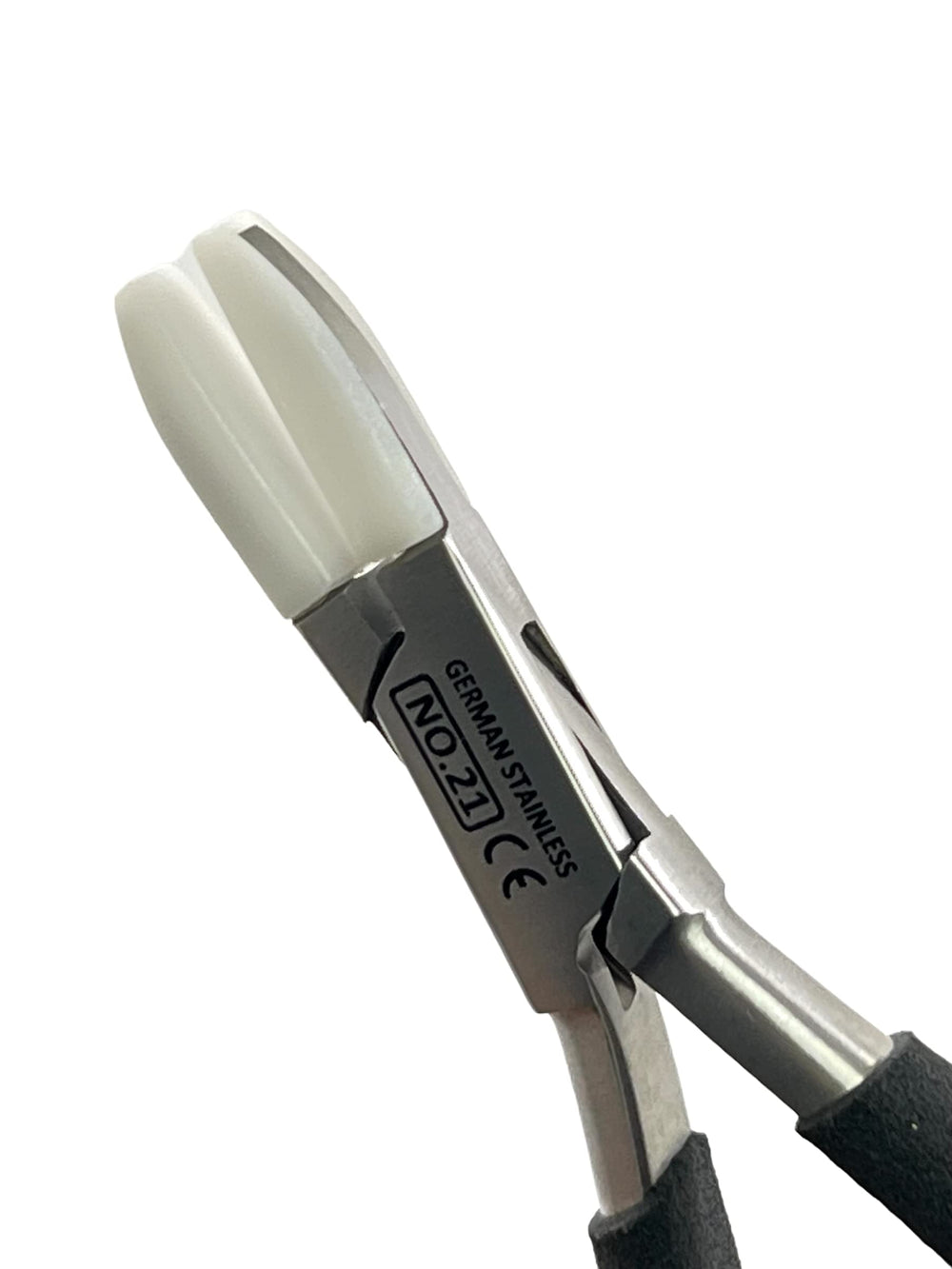 Optician workshop setting with nose pad pliers