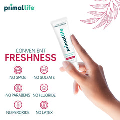 Peppermint flavored toothpaste on a toothbrush