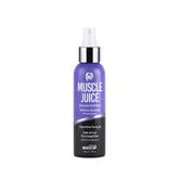 Pro Tan Muscle Juice Maximum Definition Posing Oil bottle under stage lighting (4 oz)