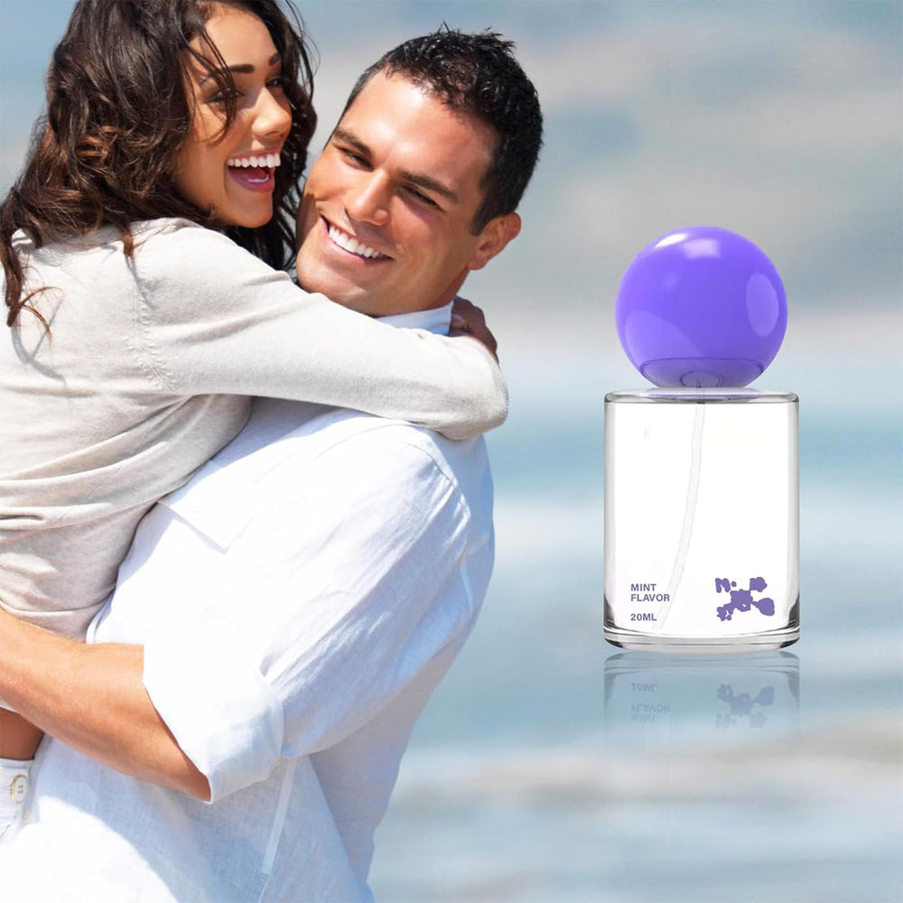 Hands holding portable travel-sized probiotic spray