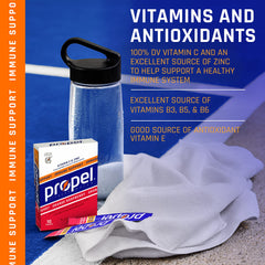 Propel powder scoop with glass of water showing powder mix