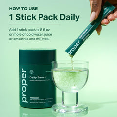 Scoop of greens powder with measuring spoon