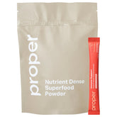 Bottle of Proper The Oranges Immune Support Supplement with scoop