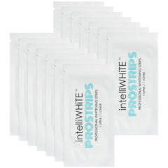 Close-up of Prostrips whitening strips applied to teeth