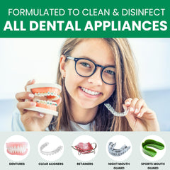 Denture cleaning solution soaking in warm water