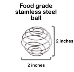 Close-up of two stainless steel shaker balls