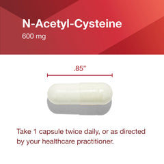 NAC capsules on white background with bottle