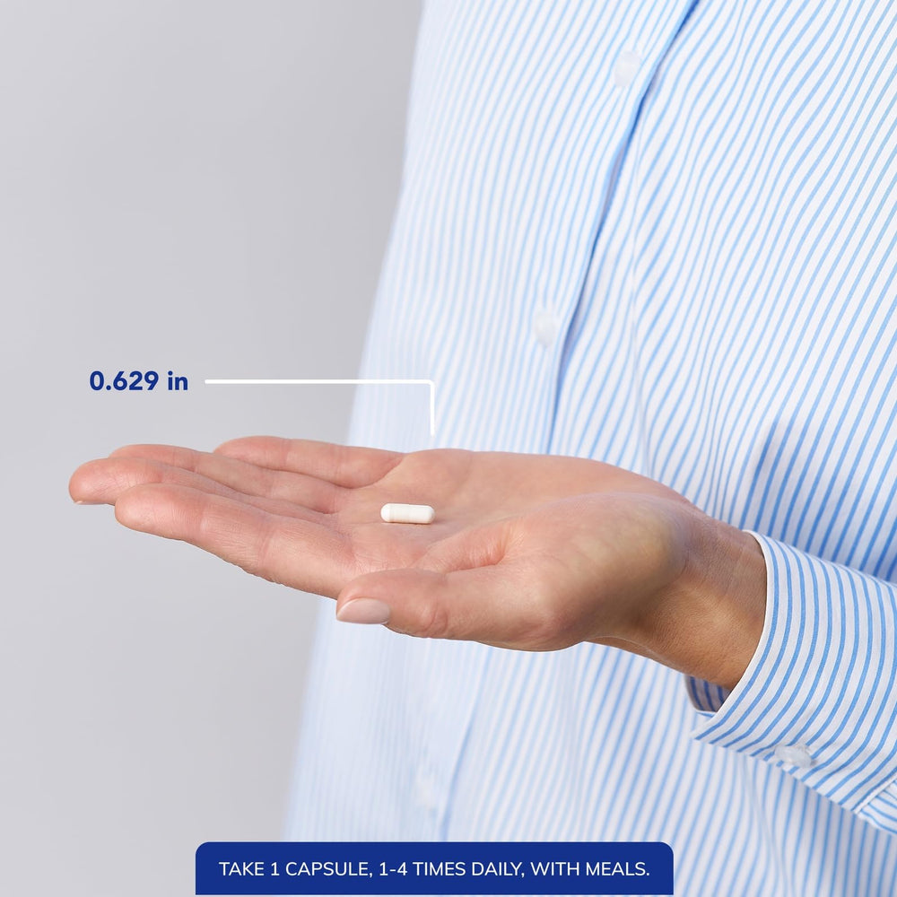 Seven capsules displayed next to bottle