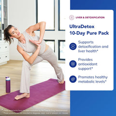 UltraDetox 10-Day Pack with glass of water demonstrates easy intake.