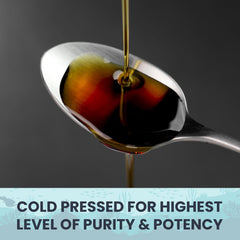 Close-up of black seed oil capsules