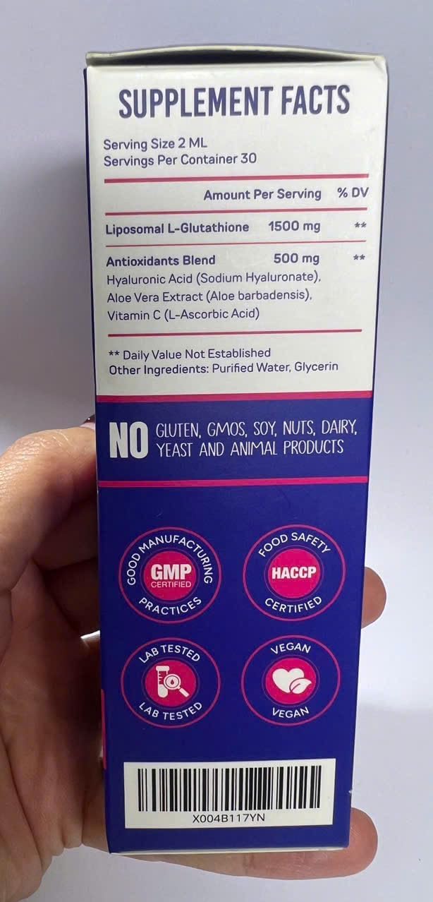 Lifestyle image of PureRootss Glutathione liquid on a desk