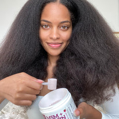 Scoop dispensing powder into water