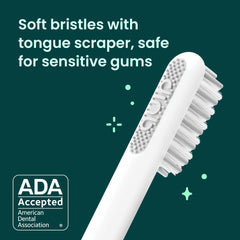 Magenta quip toothbrush showing timer feature