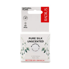 Close-up of RADIUS floss packaging and natural silk floss