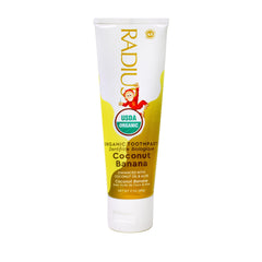 Toothpaste tube displaying Coconut Banana flavor for kids