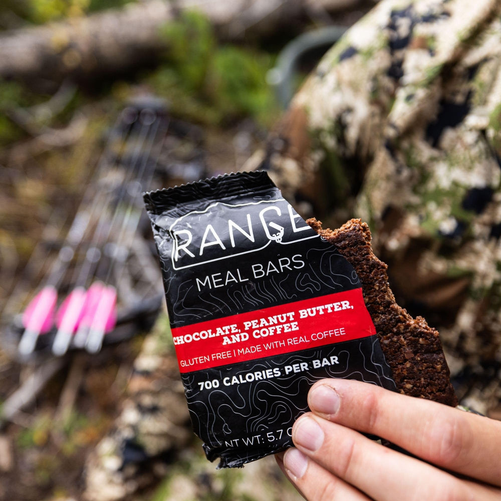 Range Meal Bar gluten-free shelf life note visible on wrapper, ideal for trips.