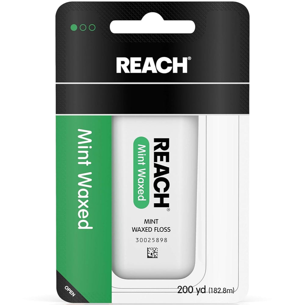Front view of Reach Mint Waxed Floss pack (5 dispensers)