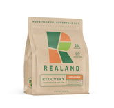 Realand Whey Protein Isolate tub highlights grass-fed protein for post-workout recovery.