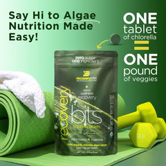 Chlorella tablets spilled on a white surface