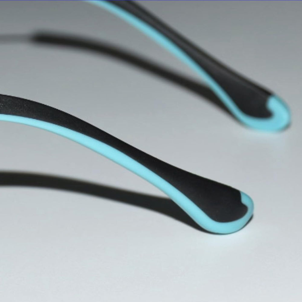 Rectangular thin metal eyeglass leg with end tip attached