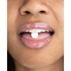 Close-up of red wine stain remover tablet