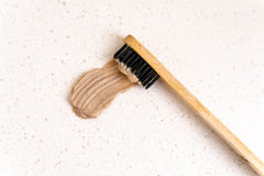 Redmond Earthpaste logo with 4 oz packaging