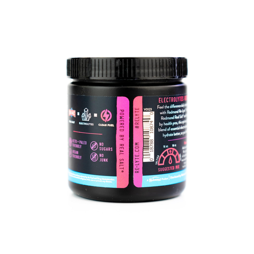 Glass of prepared Re-Lyte Electrolyte Drink Mix in Mixed Berry flavor