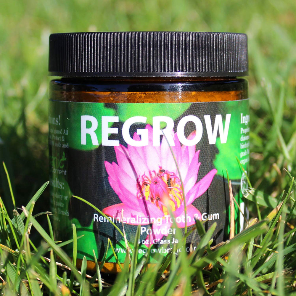 Made in USA, vegan-friendly REGROW tooth powder in a glass jar