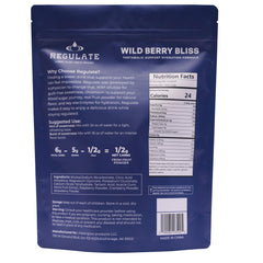 Regulate Wild Berry Bliss dissolving in water showing real fruit powder and color