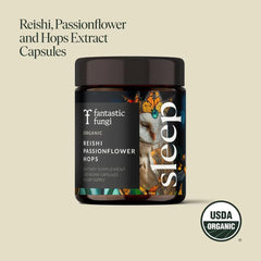 Capsules of organic mushroom sleep supplement featuring Reishi, Passionflower, and Hops