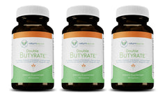 Return Healthy Double Butyrate bottle and capsules on white background