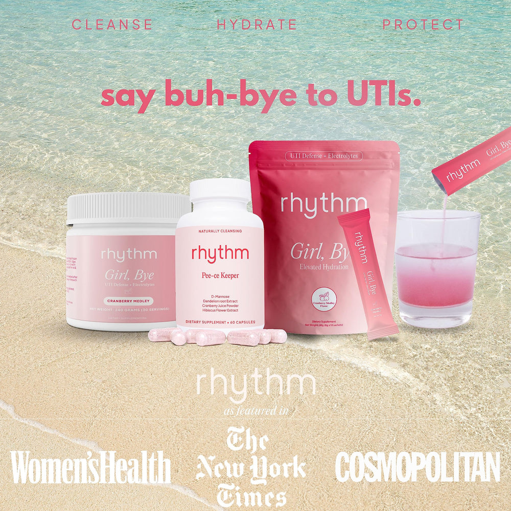 Pouring RHYTHM Girl Bye drink mix into glass with water