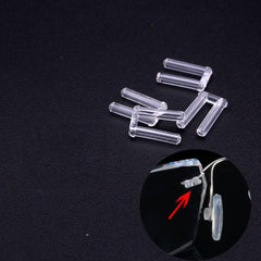 Close-up of rimless eyeglasses rubber plug components