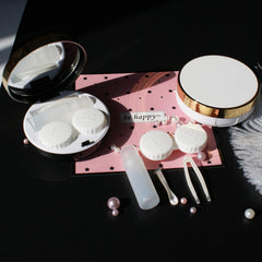 Contact lens applicator tool included in kit