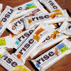 Gourmet all-natural Rise Whey Protein Bar Honey Cinnamon lifestyle shot