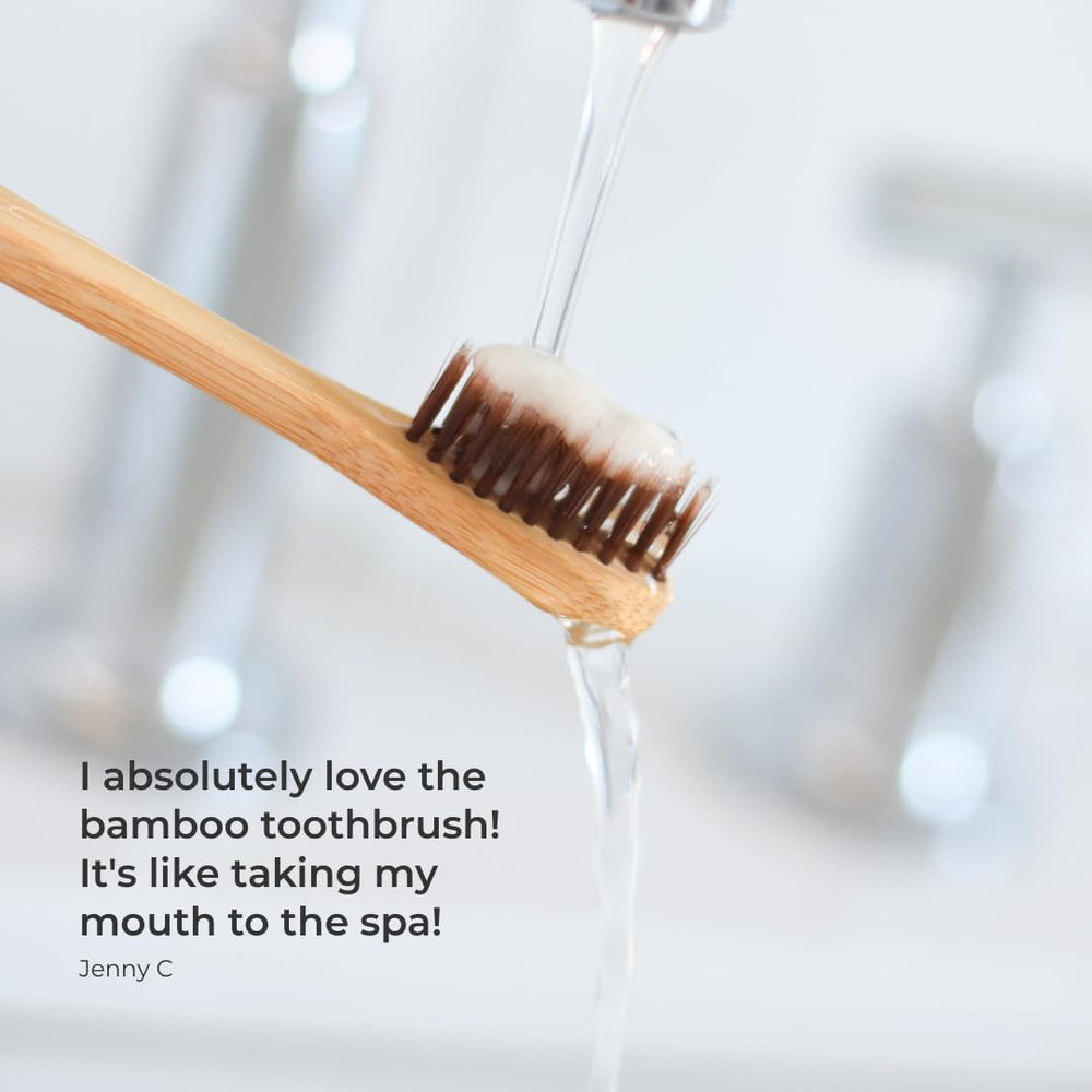 Close-up of bamboo handle and bristles on RiseWell Toothbrush